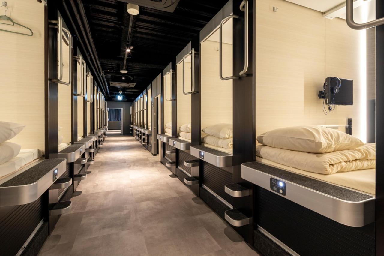 Capsule Hotel Cube Хиросима Экстерьер фото