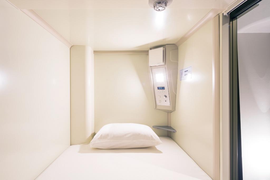 Capsule Hotel Cube Хиросима Экстерьер фото